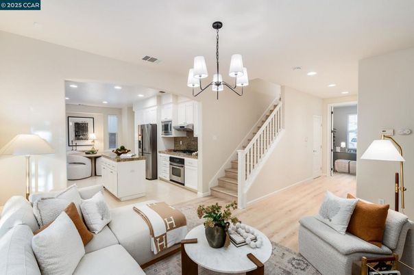 Chandelier, Interior, Kitchen, Living room, Recessed Lighting, Stainless Steel Appliances, Wood Texture Flooring