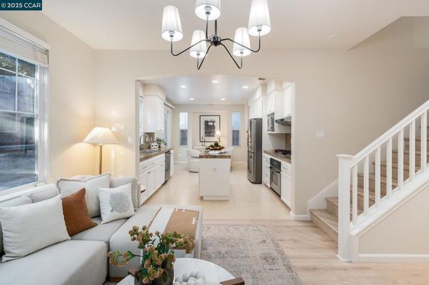 Chandelier, Interior, Kitchen, Living room, Pendant Lights, Recessed Lighting, Stainless Steel Appliances, Wood Texture Flooring