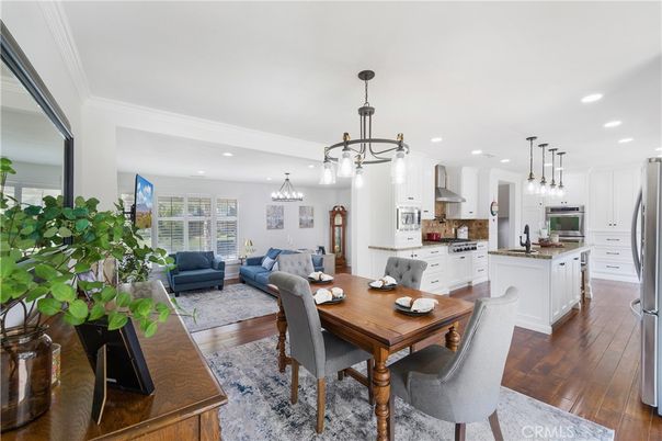 Dining room, Interior, Kitchen, Living room, Pendant Lights, Recessed Lighting, Stainless Steel Appliances, Wood Texture Flooring