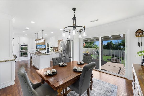 Dining room, Interior, Kitchen, Pendant Lights, Recessed Lighting, Stainless Steel Appliances, Wood Texture Flooring
