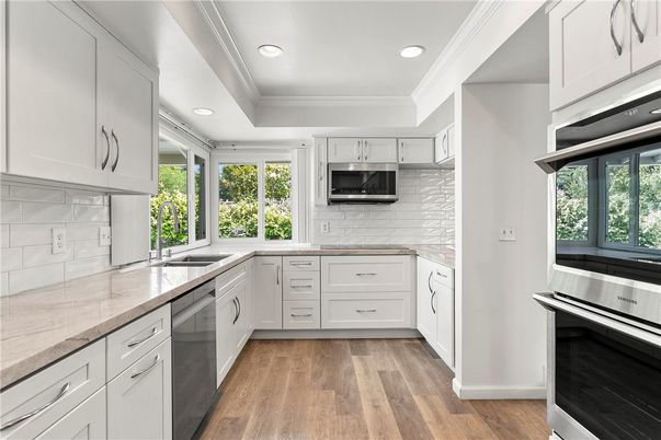 Interior, Kitchen, Recessed Lighting, Stainless Steel Appliances, Wood Texture Flooring