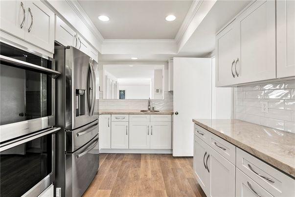 Interior, Kitchen, Recessed Lighting, Stainless Steel Appliances, Wood Texture Flooring
