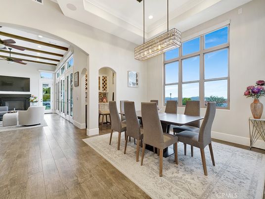 Chandelier, Dining room, Fireplace, Interior, Living room, Pendant Lights, Recessed Lighting, Wooden Beams, Wood Texture Flooring