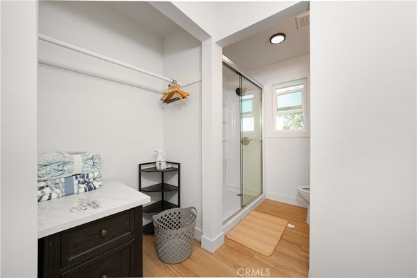 Bathroom, Glass Shower, Interior, Recessed Lighting, Wood Texture Flooring