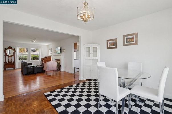 Chandelier, Dining room, Fireplace, Interior, Living room, Pendant Lights, Wood Texture Flooring