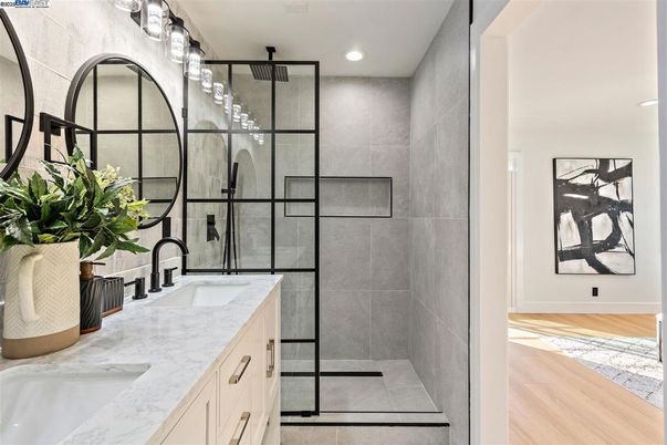 Bathroom, Dual Sink Vanities, Glass Shower, Interior, Recessed Lighting, Wood Texture Flooring