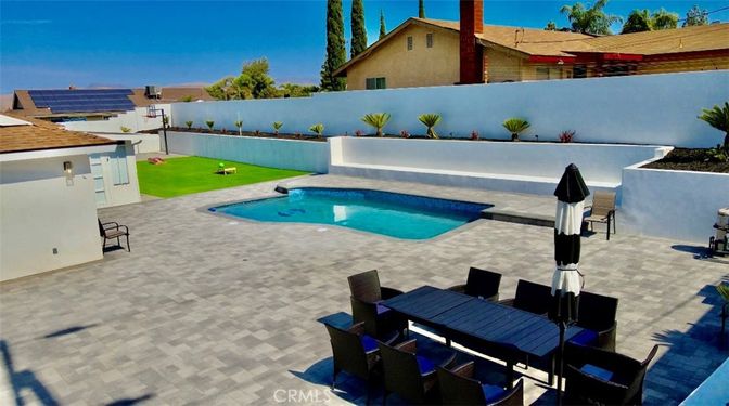 Exterior, Pool, Solar Panels
