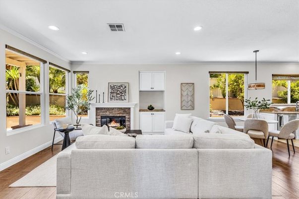 Dining room, Fireplace, Interior, Living room, Pendant Lights, Recessed Lighting, Wood Texture Flooring