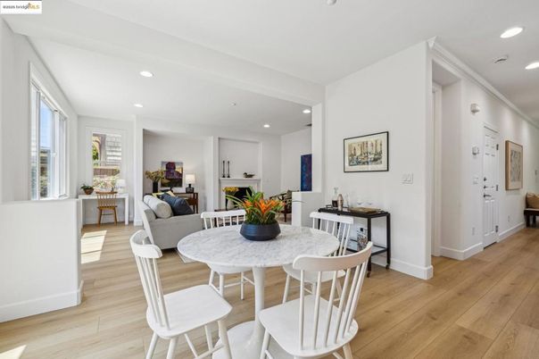Dining room, Fireplace, Interior, Living room, Recessed Lighting, Wood Texture Flooring