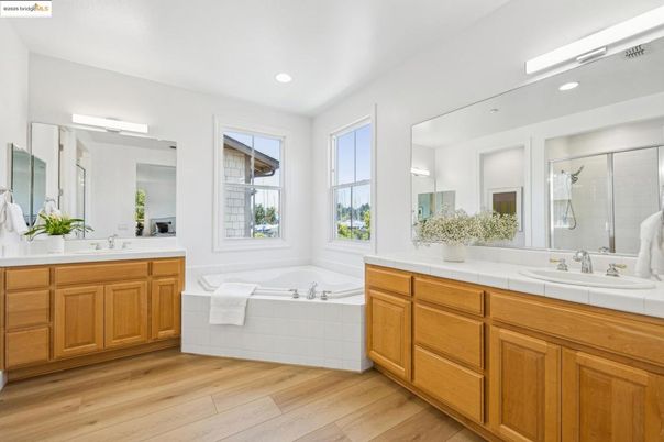 Bathroom, Dual Sink Vanities, Interior, Recessed Lighting, Tile Countertops, Wood Texture Flooring