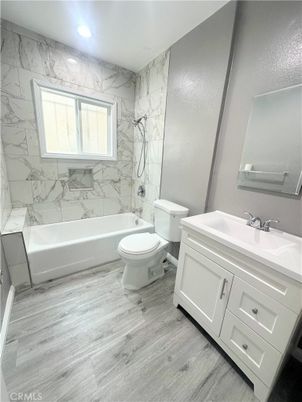 Bathroom, Interior, Marble Walls, Recessed Lighting, Wood Texture Flooring