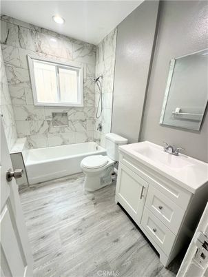 Bathroom, Interior, Marble Walls, Recessed Lighting, Wood Texture Flooring