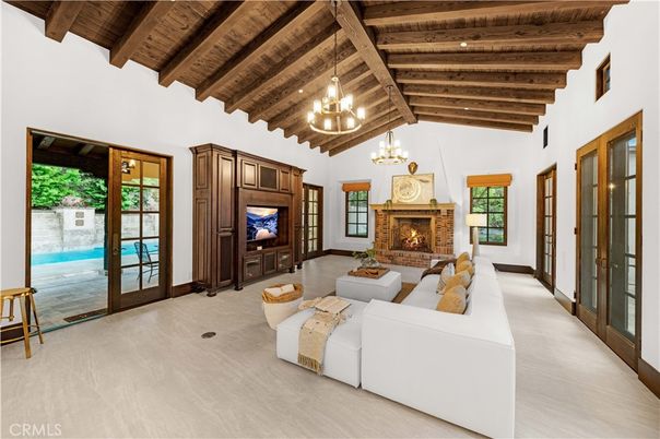 Chandelier, Fireplace, Interior, Living room, Recessed Lighting, Wooden Beams, Wooden Ceilings