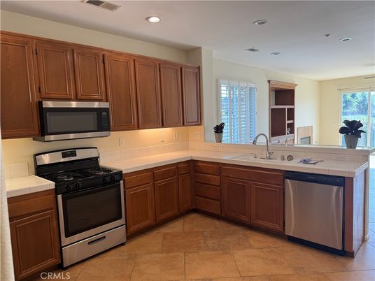 Interior, Kitchen, Recessed Lighting, Stainless Steel Appliances, Tile Countertops