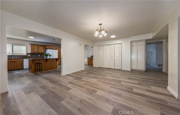 Chandelier, Empty room, Interior, Kitchen, Recessed Lighting, Wood Texture Flooring