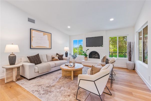 Fireplace, Interior, Living room, Recessed Lighting, Wood Texture Flooring