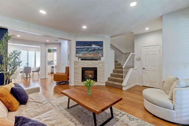 Dining room, Fireplace, Interior, Living room, Recessed Lighting, Wood Texture Flooring