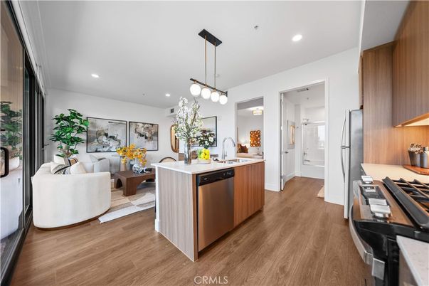 Dining room, Interior, Kitchen, Living room, Pendant Lights, Recessed Lighting, Stainless Steel Appliances, Wood Texture Flooring