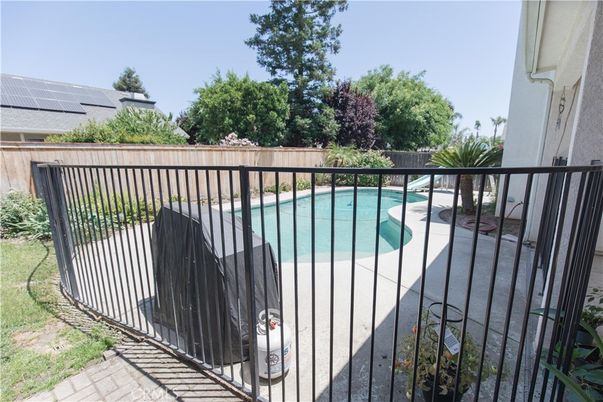 Exterior, Pool, Solar Panels