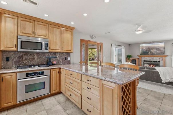 Fireplace, Interior, Kitchen, Recessed Lighting, Stainless Steel Appliances