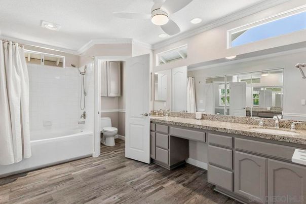 Bathroom, Dual Sink Vanities, Interior, Recessed Lighting, Wood Texture Flooring