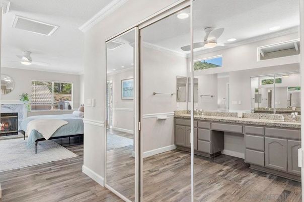 Bathroom, Bedroom, Dual Sink Vanities, Fireplace, Interior, Recessed Lighting, Wood Texture Flooring