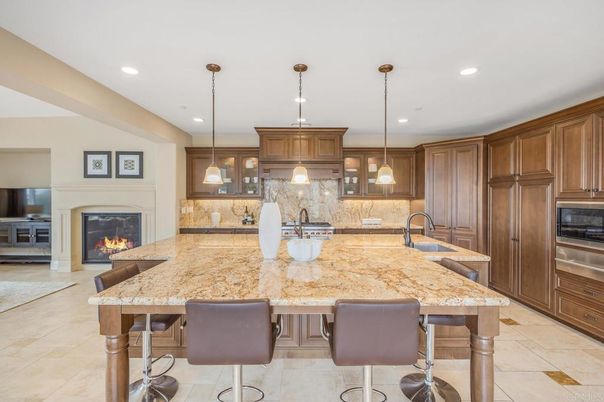 Fireplace, Interior, Kitchen, Pendant Lights, Recessed Lighting, Stainless Steel Appliances