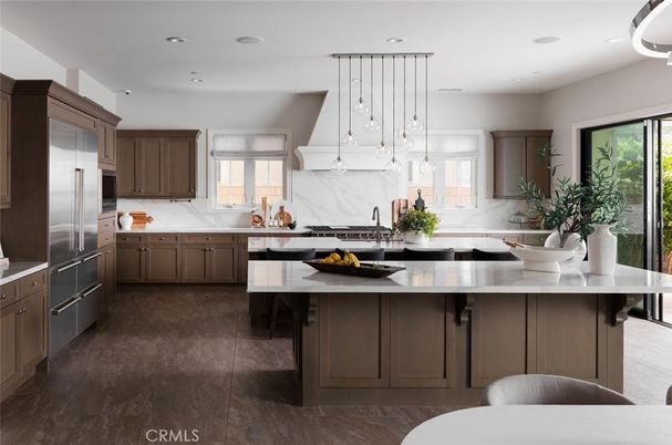 Interior, Kitchen, Marble Walls, Pendant Lights, Recessed Lighting, Stainless Steel Appliances