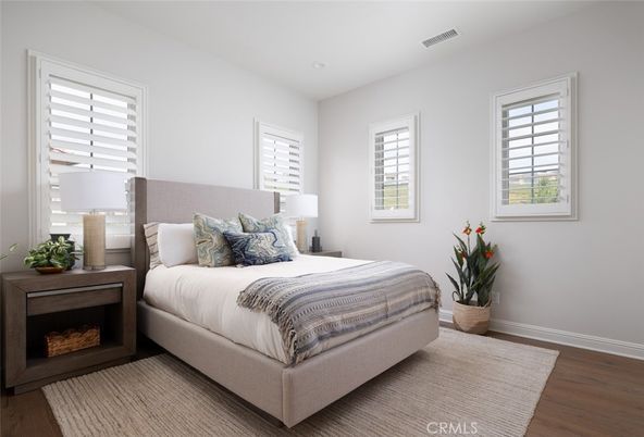 Bedroom, Fireplace, Interior, Recessed Lighting, Wood Texture Flooring