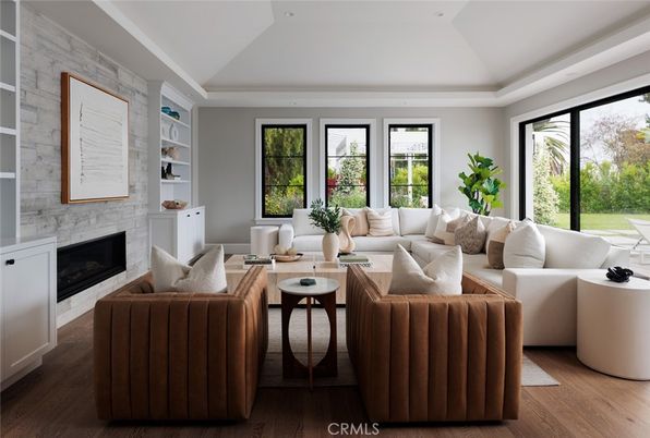 Fireplace, Interior, Living room, Recessed Lighting, Stone Walls, Wood Texture Flooring