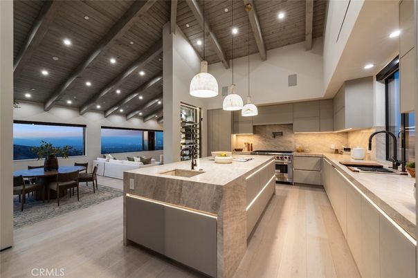 Dining room, Interior, Kitchen, Living room, Pendant Lights, Recessed Lighting, Stainless Steel Appliances, Water, Wooden Beams, Wooden Ceilings, Wood Texture Flooring