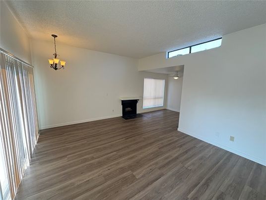 Chandelier, Empty room, Fireplace, Interior, Pendant Lights, Wood Texture Flooring