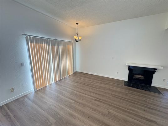 Chandelier, Empty room, Fireplace, Interior, Wood Texture Flooring