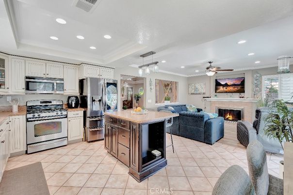 Fireplace, Interior, Kitchen, Living room, Recessed Lighting, Stainless Steel Appliances