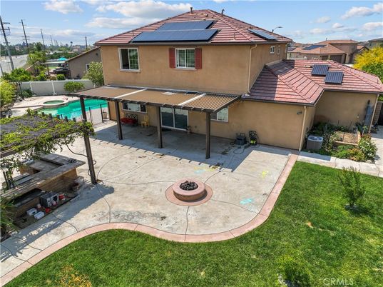 Exterior, Pool, Solar Panels