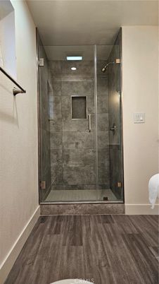 Bathroom, Glass Shower, Interior, Recessed Lighting, Wood Texture Flooring