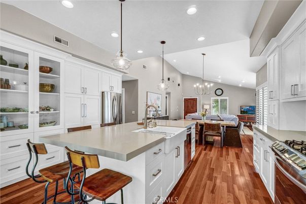 Dining room, Interior, Kitchen, Living room, Pendant Lights, Recessed Lighting, Stainless Steel Appliances, Wood Texture Flooring