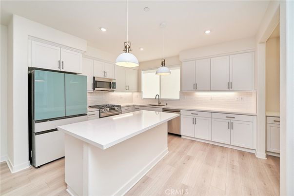 Interior, Kitchen, Pendant Lights, Recessed Lighting, Stainless Steel Appliances, Wood Texture Flooring