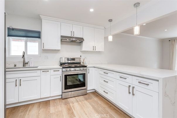 Interior, Kitchen, Pendant Lights, Recessed Lighting, Stainless Steel Appliances, Wood Texture Flooring