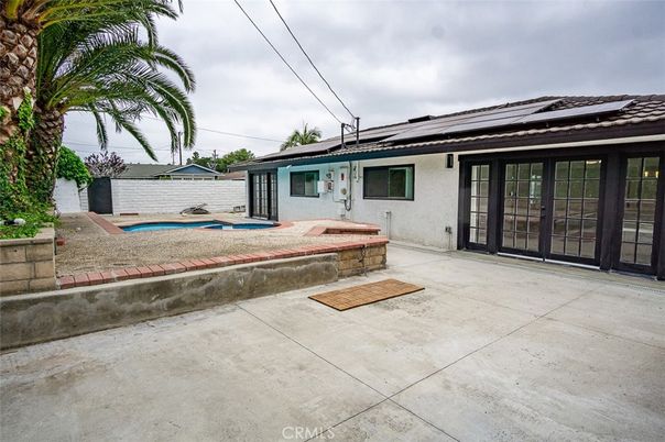 Exterior, Pool, Solar Panels