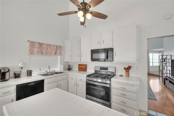 Interior, Kitchen, Tile Countertops, Wood Texture Flooring