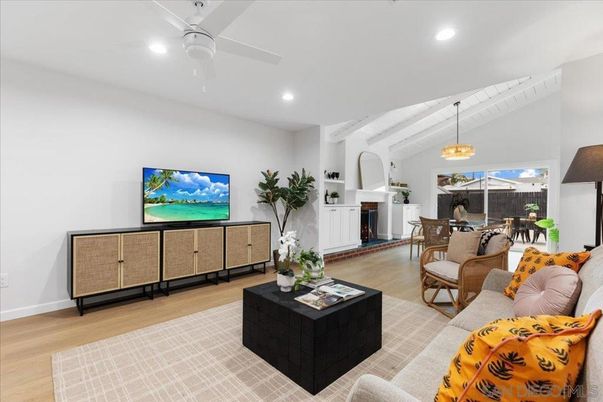 Dining room, Fireplace, Interior, Living room, Pendant Lights, Recessed Lighting, Wood Texture Flooring