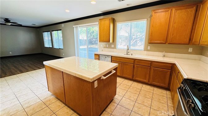 Interior, Kitchen, Recessed Lighting, Tile Countertops, Wood Texture Flooring