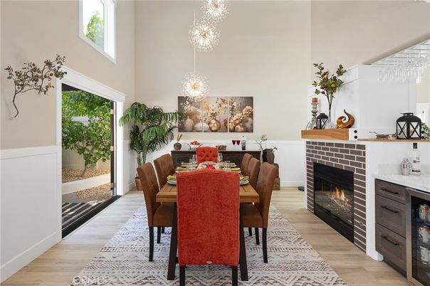 Chandelier, Dining room, Fireplace, Interior, Pendant Lights, Wood Texture Flooring