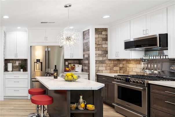 Chandelier, Interior, Kitchen, Pendant Lights, Recessed Lighting, Stainless Steel Appliances, Wood Texture Flooring