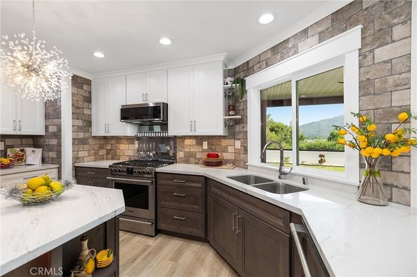 Interior, Kitchen, Pendant Lights, Recessed Lighting, Stainless Steel Appliances, Stone Walls, Wood Texture Flooring