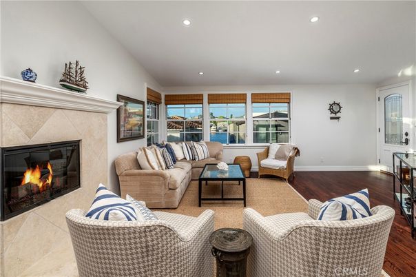 Fireplace, Interior, Living room, Recessed Lighting, Water, Wood Texture Flooring