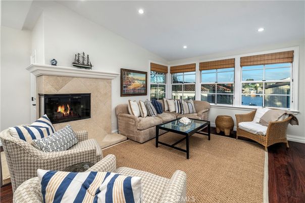 Fireplace, Interior, Living room, Recessed Lighting, Water, Wood Texture Flooring
