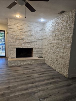 Empty room, Fireplace, Interior, Stone Walls, Wood Texture Flooring