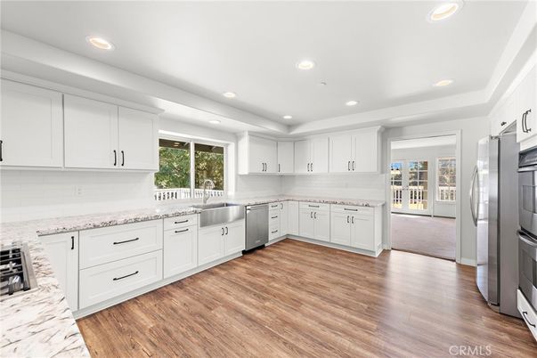 Interior, Kitchen, Recessed Lighting, Stainless Steel Appliances, Wood Texture Flooring